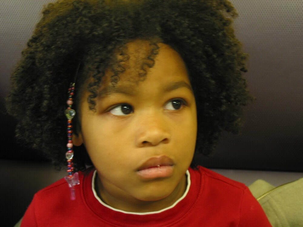 girl with beads in her hair