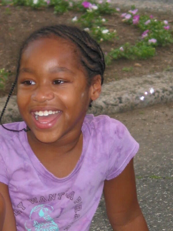 smiling past the camera