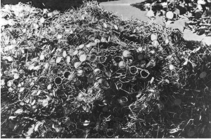 glasses pile- genocide